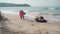 Morjim, India December 14, 2019: Cleaners establish order on seacoast from garbage. Workers make clean sandy beach for