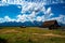 Mormon home and barn by the mountain