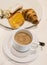 The morning Breakfast , coffee Cappuccino with croissants