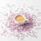 Morning breakfast with coffee cup and lilac flowers on white background. Flat lay, top view women background. Minimal concept,