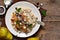 Morning breakfast. Oatmeal, caramelized pear and fried hazelnuts