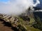 The morning clouds lifting to reveal Machu Picchu, Peruvian Andes, South America