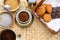 Morning coffe table with sugar, chocolate and biskits