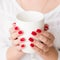 Morning coziness woman hands hold cup