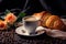 Morning Elegance: Croissant and Coffee Cup with Floral Table Setting in a Wide Banner with Copy Space Area. created with