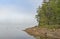 Morning Fog Lifting in the North Woods