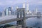 Morning fog over the Brooklyn Bridge looking into Manhattan, NY