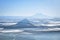 Morning fog over the Elbrus Mount in winter