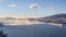 Morning fog over mountain lake at foothills of Rocky Mountains