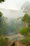Morning fog at the river deep into the rainforest of Danum Valley in Sabah on the island of Malaysian Borneo.