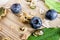 Morning healthy food with Granola and muesli, berries placed in  beautiful wood tray,concept for sustainable health