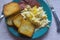 Morning homemade breakfast. Omelette, bread, sausage.