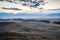 Morning in the Kurai steppe, dirt road through the hills