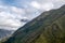 Morning landscape with Peruvian Andes mountains peaks covered with clouds at sunrise