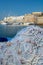 Morning landscape photo made in Gallipoli pier, colorful fishermen net after fishing, Apulia, Italy