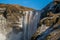 Morning landscapes at Skogafoss Skoga waterfall with rainbow in Iceland