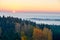 Morning landspace with sun rays. Beautiful landscape with forest and fog.Lithuanian landscape