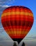 Morning launch of multiple hot-air balloons.