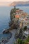 Morning lights of Vernazza on its rock