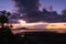 Morning low tide sea with dark dawn sky.