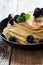 Morning meal, homemade crepes, fresh summer blackberries