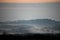 Morning mist over farmland