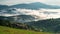 Morning mists over the mountain slopes