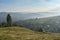 Morning misty landscape: mountain village, mountain slopes