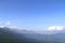 Morning mountain landscape with layer of mountain peaks covered