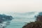 Morning in the mountains. The Ganges River in the foothills of the Himalayas. India. view of Lakshman Jhula bridge early morning.