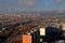 Morning panorama of the city overlooking the railroad tracks and the overpass under construction.