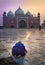 A morning prayer, Sunrise in Agra, India at the Taj Mahal