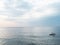 Morning scene at the beach. Bay of bengal. Boatmen in the sea. Calm serene. Fishing Boat