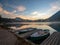 Morning scenery with boats moored on Hintersee lake at sunrise