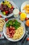 Morning Scrambled egg, bacon breakfast with orange juice, milk, fruit, bread on white plate