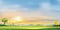 Morning sky in spring time,Summer landscape in village with meadow on hills with orang and blue sky, Panoramic countryside of