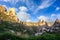 In the morning, the sun hits the golden peaks and blue skies of Cappadocia, Turkey