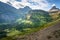 Morning sun lits up the Heavy Runner Mountain and surrounding peaks along the Going To The Sun Road in Glacier National Park,