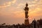 Morning sunrise Buddha statue standing at Wat Phra That Khao Noi in Nan,Thailand