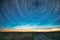 Morning Sunrise In Countryside. Unusual Amazing Effect Of Cloud And Stars Trails Above Countryside Rural Field Landscape