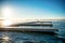 Morning Sunrise on a dock with Muskoka Chairs