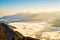 Morning sunrise, dramatic cloud of sea, giant rocks and Yushan mounatin under bright blue sky in AlishanAli mountain National Pa