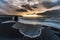 Morning Sunrise in Iceland Black Sand Beach With Ocean Water Waves and Stormy Clouds. Vik Vikurbraut