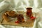 Morning turkish tea in traditional glass with bagel on the tray