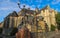 Morning view of the impressive gothic Saint Michael`s Church and lamp post of Saint Michel bridge in Ghent.