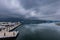 The morning view over Sun Moon Lake Marina in Taiwan is breathtaking, with calm waters reflecting the vibrant sunrise, surrounded