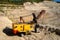 Morning view of a quarry excavator in the Zhiguli limestone quarry