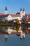 Morning view of Telc or Teltsch town mirroring in lake