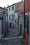 Morning walk in empty Croatian city of Rovinj.Picturesque narrow cobblestone streets,colorful facades,small shops