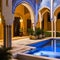 A Moroccan courtyard pool area with mosaic tiles, ornate arches, and a mosaic-tiled hot tub3